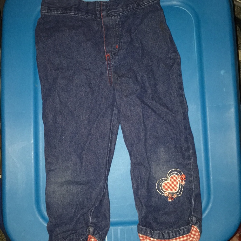 Dark wash jeans with checkered details